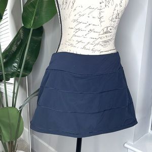 Navy Blue Lululemon Skirt with Lined Shorts with two pockets and a zip pocket